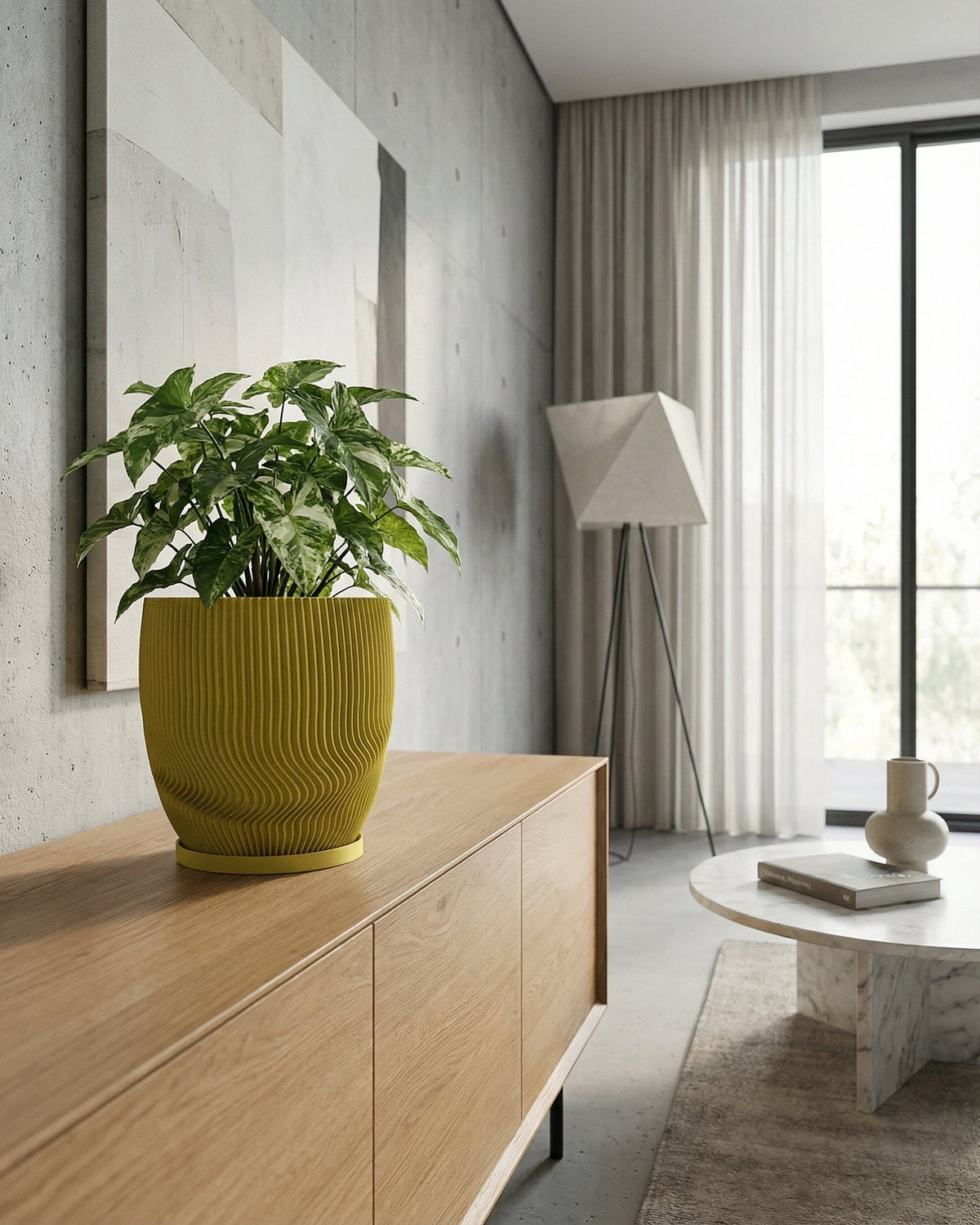 A green plant sits in a yellow planter pot on a wooden cabinet in a modern living room. The planter pot is the focal point.