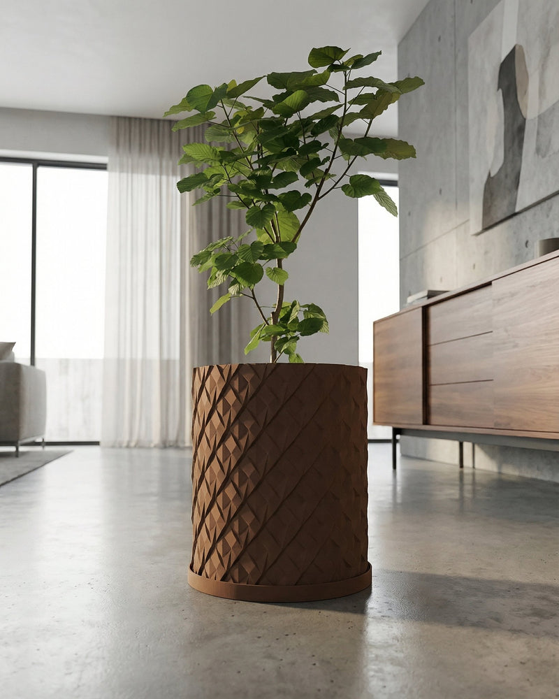 A Monstera plant with variegated leaves sits in a brown woven planter pot on a gray floor against a dark background.