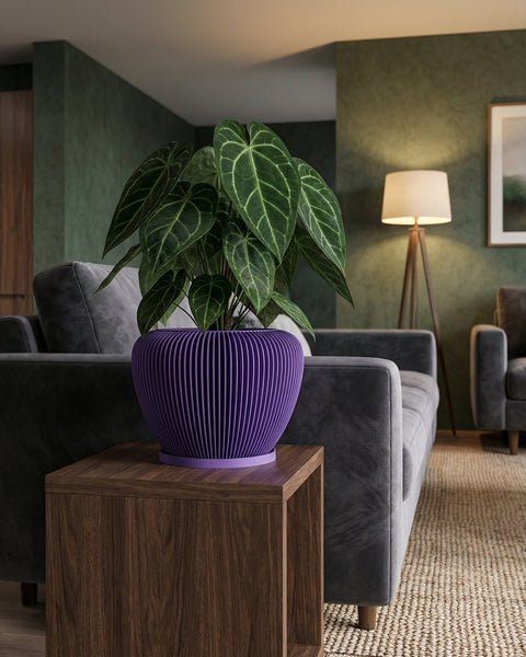 A purple planter pot with a green plant sits on a wooden table in a living room setting.