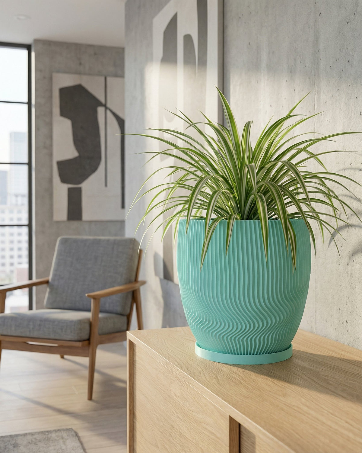 A turquoise planter with a spider plant sits on a wooden cabinet in a modern living room.