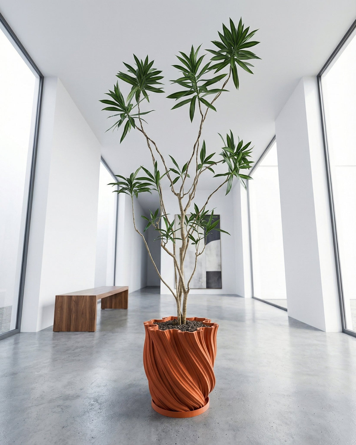 A vibrant pothos plant cascades from a textured terracotta planter, adding a touch of nature to a cozy living space.