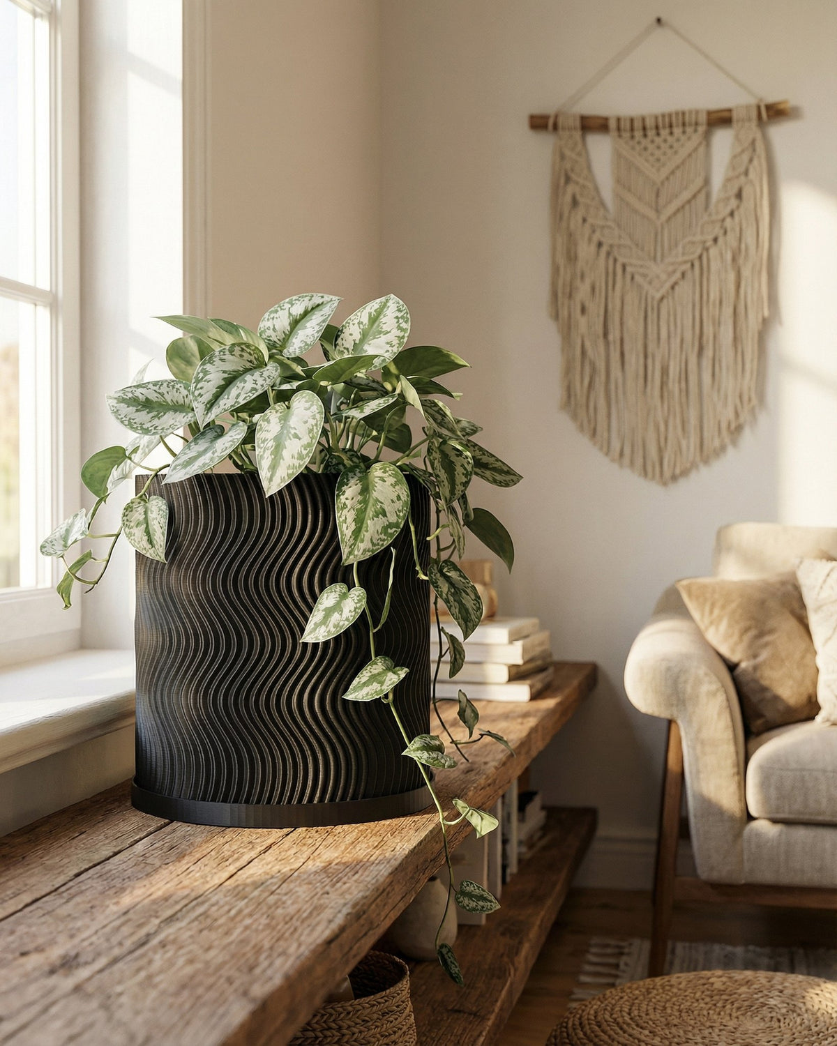 A planter pot with a wavy design sits on a wooden shelf next to a window, filled with a lush, leafy plant.