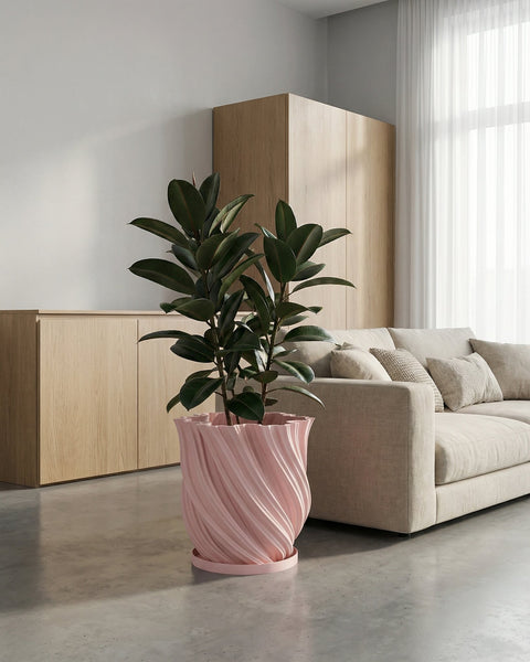 A pink planter pot with a green plant sits on a white windowsill, bathed in sunlight. The pot has a textured, woven design.